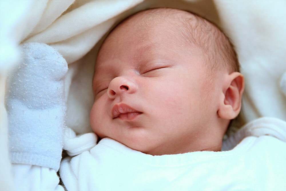 Infant with reflux sleeping